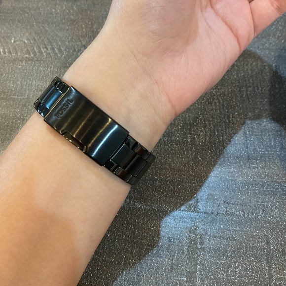 Black Fossil watch with gold and rhinestone detail. - Picture 3 of 3